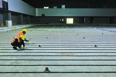 “冰坛”主体近一半采用钢结构建设。